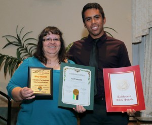 Mary Madrid (pictured with her son, Tass Duarte) was inducted into the George Perry Volunteer Hall of Fame.